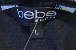 Playera/ Blusa Dama Deportiva Marca Bebe Negra Talla Grande 7 Playera/ Blusa Dama Deportiva Marca Bebe Negra Talla Grande -Promos Tops Deportivos Magasin D NQ NP 933147 MLM53090999866 122022 O